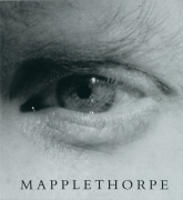 Close up of Robert Mapplethorpe's eye with black text at bottom of book cover