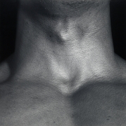 Close up of a man's neck.