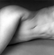 Reclining nude woman's torso.