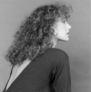 Portrait of Marissa Berenson in profile.