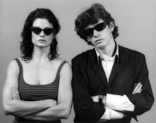 Portrait of Lisa Lyon and the artist in sunglasses.