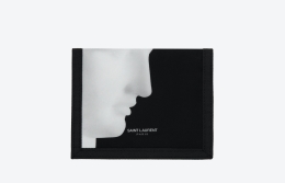 Wallet with a close up photograph of a sculpture of Ermes against a black background.