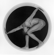 Black male nude posing in a circle.