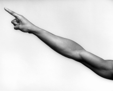 Portrait of Ken Moody's arm with outstretched finger.