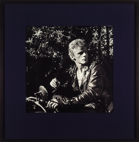 Portrait of white male on motorcycle.