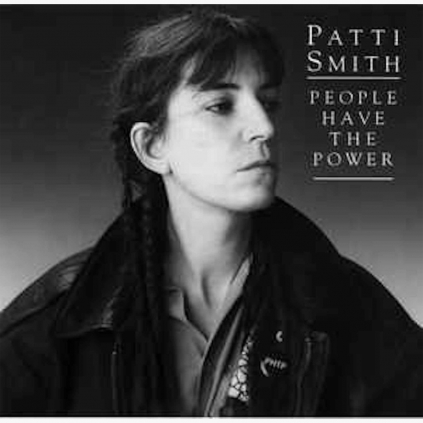Patti Smith People have the power album cover, with portrait of Patti in braids and leather jacket, looking towards the right.