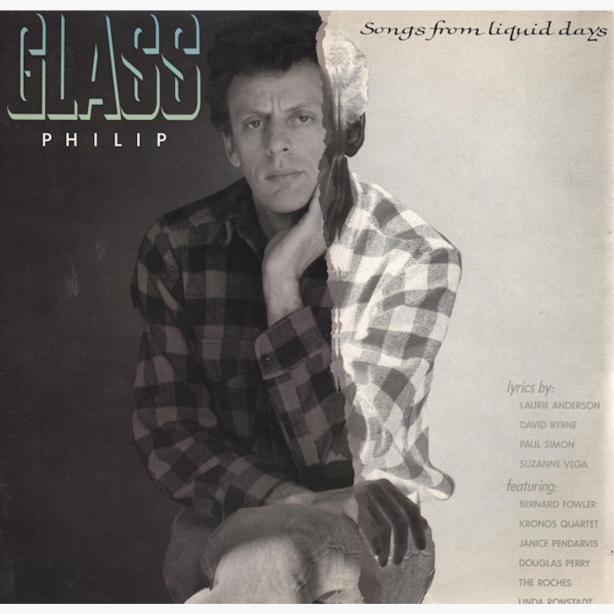 Cover of Philip Glass's album Songs from Liquid Days, Philip seated on a stool, legs crossed, hand against face.